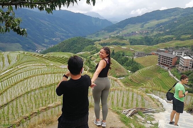 1-DAY Private Longji Rice Terraces and Minority Villages Tour - A guide who drives, explains, and adjusts the day