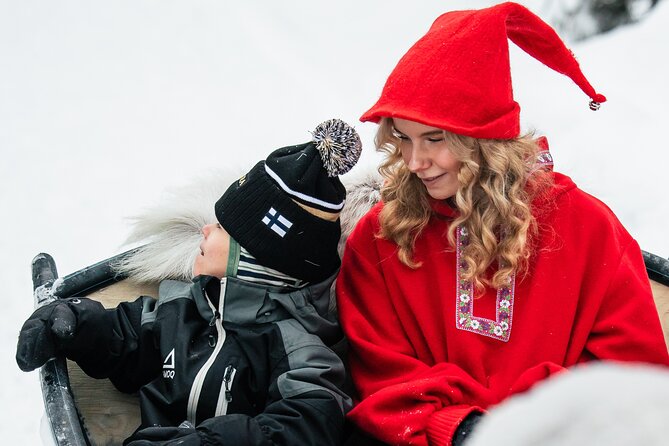 2km Sleigh Ride & Feeding Experience at Traditional Reindeer Farm - Warming up in a hut by the fire