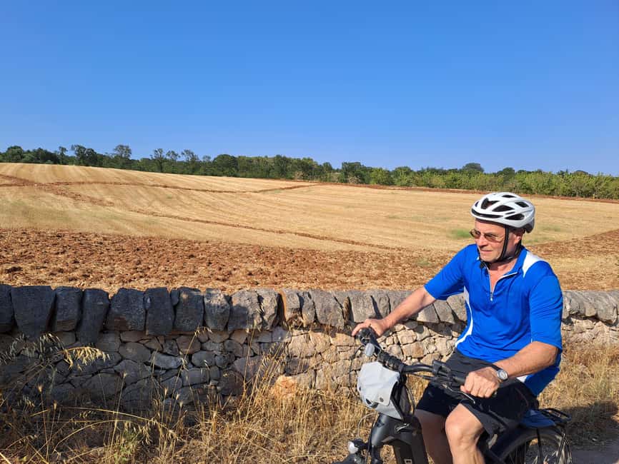 Alberobello: Guided e-bike tour + donkey farm visit - Returning to Alberobello’s trulli