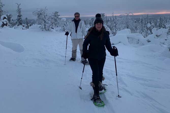 Arctic Reindeer Farm Experience with Snowshoeing in the Wild - Snowshoes across the frozen lake