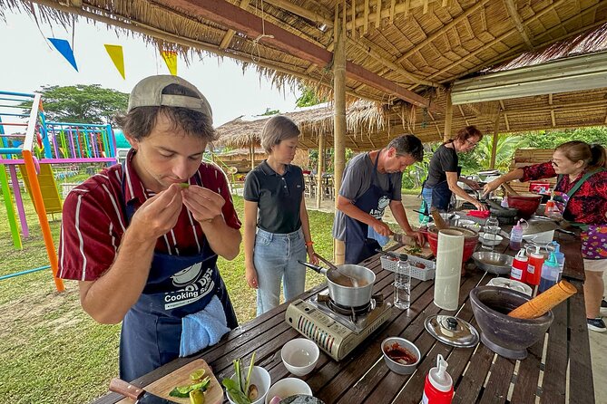 Aroidee’s Farm-Fresh Thai Cooking Experience - Collecting eggs and meeting the farm animals