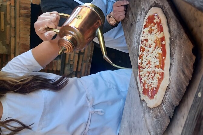 Authentic Farm Tour with Pizza, Cheese, Wine & Limoncello Tasting - Making pizza with Anna and the family