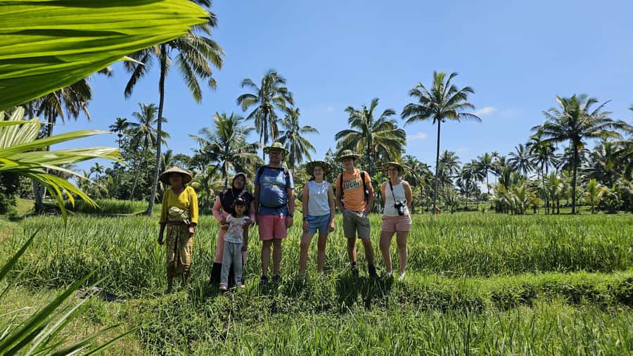 Benang Kelambu: Authentic Lombok Rice Field & Waterfall Tour - Walking through Gunung Jae rice fields