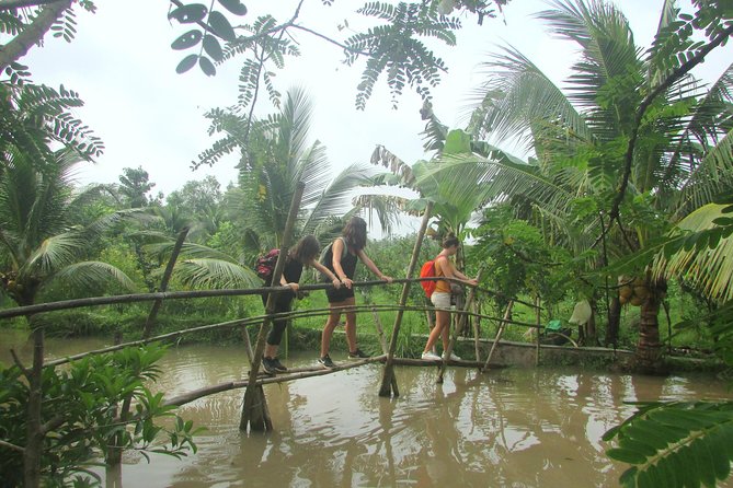 Cai Rang floating market, see sunrise, CaCao orchard, small canal - Sampling fruit and cacao at Muoi Cuong