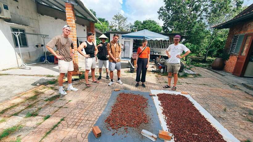 Can Tho: Countryside Cycling Tour with Cocoa Farm Visit - Crossing the river by ferry