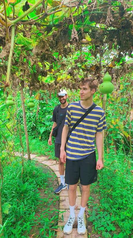 Can Tho: Countryside Cycling Tour with Cocoa Farm Visit - Sugarcane juice and fruit on the way back