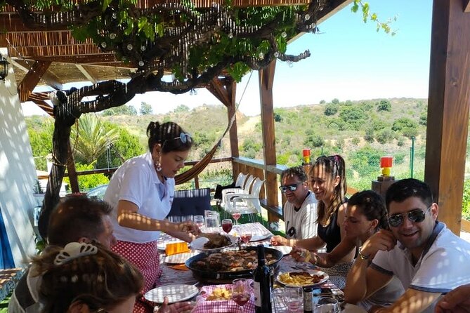 Chefcooking Paella from our Andalusian Grandmother at a Family Farm - A family recipe with a farm attached