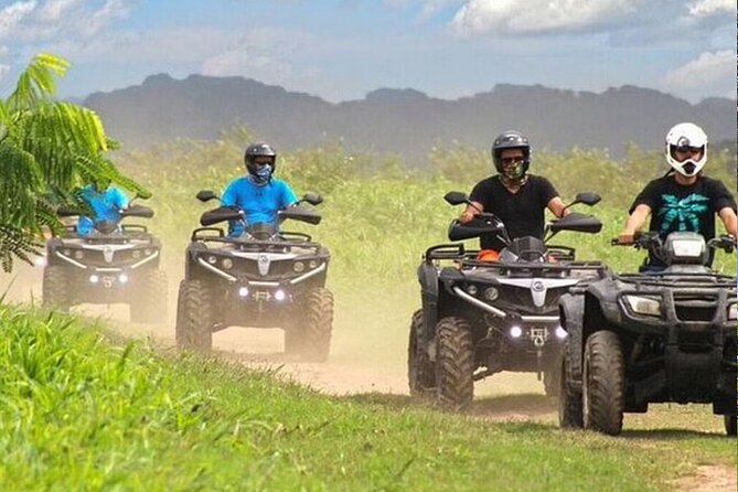 Double ATV Adventure: Private Hacienda Experience with Transfer - Following the guide through fields and forest