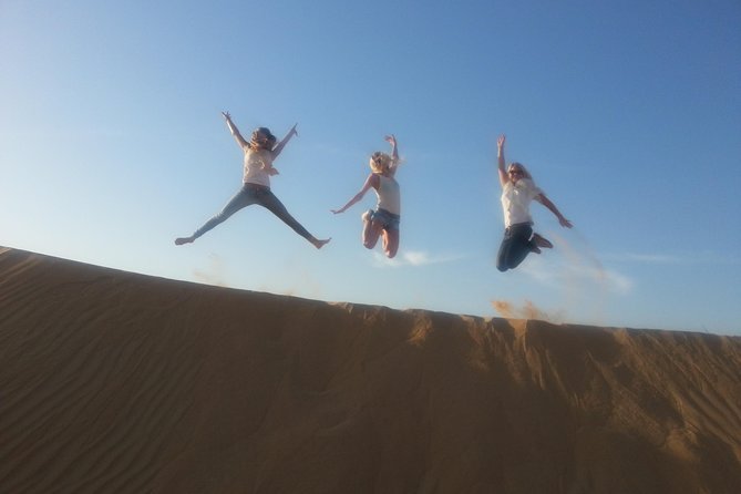 Dubai Desert Morning Tour in 4WD Vehicle: Camel Ride, Quad Bike Tour, Sandboarding, and Camel Farm - Sandboarding Down a Steep Dune