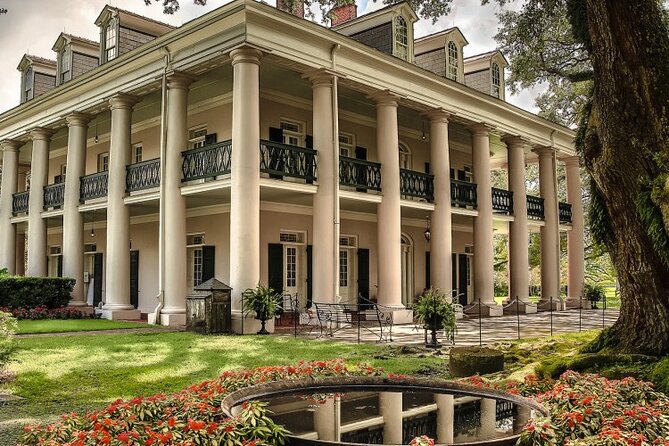 Explore Oak Alley Plantation Guided Tour with Transportation - Sugar Cane Theater and working plantation displays