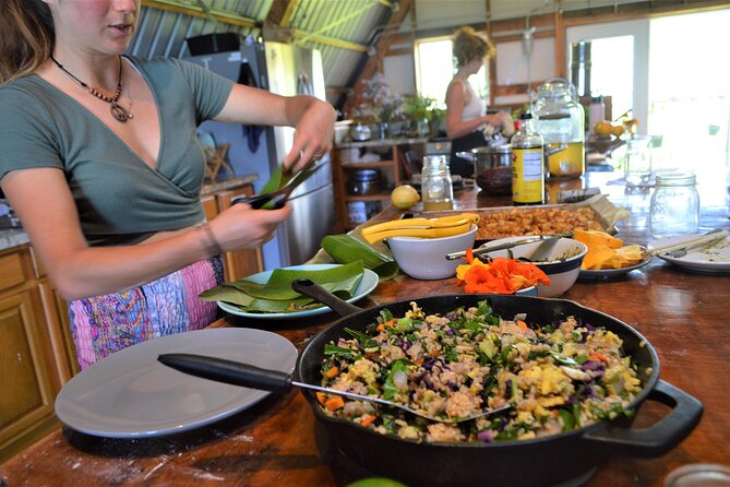 Farm to Table Cooking Class at Kulaniapia Falls - Picking ingredients from volcanic soil