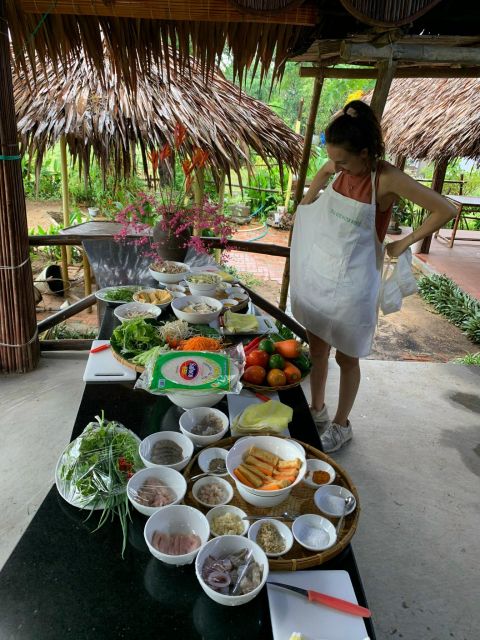 Farming with Farmers at ancient vegetable Village "Tra Que" - The water buffalo and basket boat add some fun