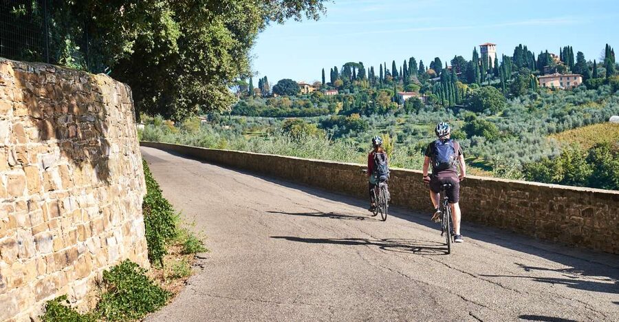 From Florence: Tuscan Hills Biking with Farm Tour and Lunch - The first climb rewards you with Florence views