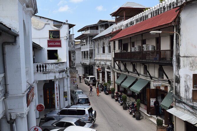 Full-Day Private Stone Town Spice Farm and Prison Island Tour - Walking through Stone Town’s layered past
