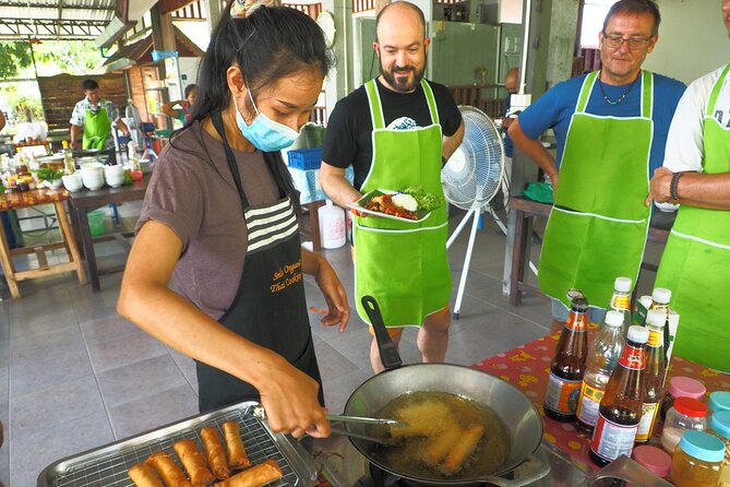 Full Day Thai Cooking at Farm (Chiang Mai) - Adjusting spice and cooking without meat