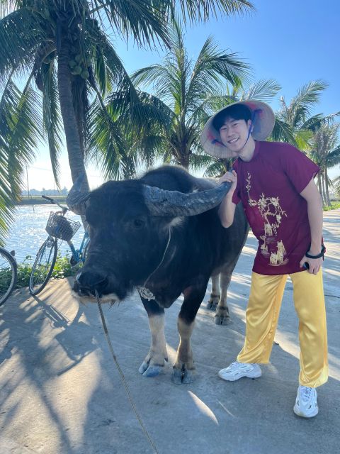 Funny day Biking, Farming, Buffalo riding and Basket boat - Riding a water buffalo with a local farmer