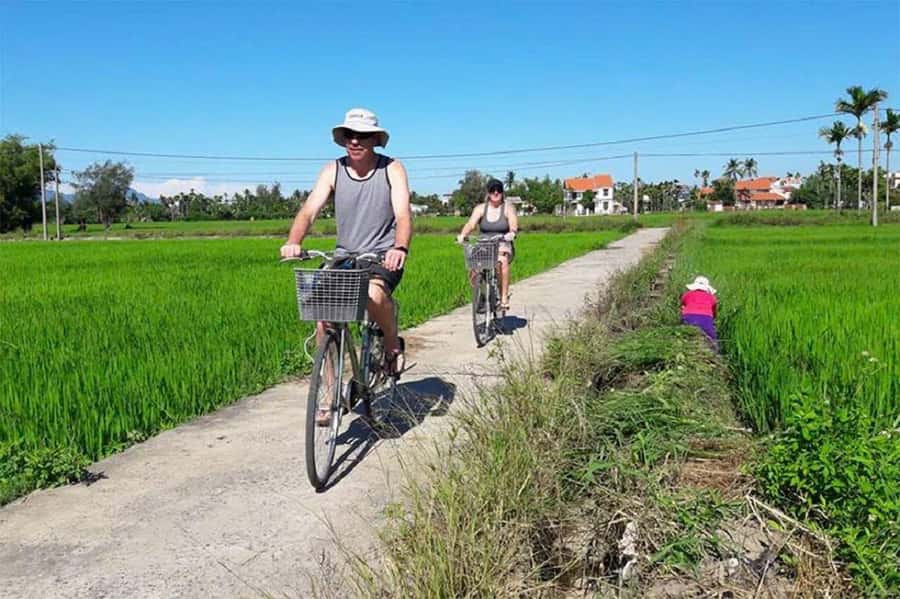 Hoi An: Countryside Bicycle Tour with Farm, Basket Boat Ride - Learning to fish with bamboo traps and nets