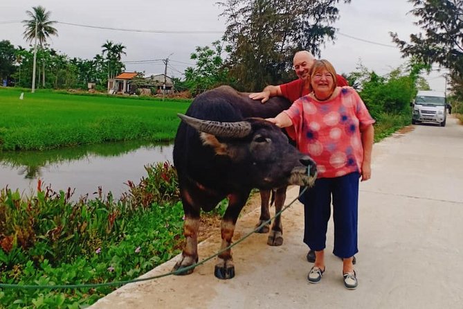 Hoi An Countryside Tour with Bamboo Basket Boat Rowing , Buffalo Ride, Farming - Tra Que Vegetable Village: work before lunch
