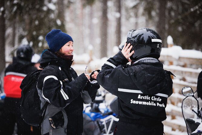 Husky and Reindeer Experience With Snowmobiling - The snowmobile ride across snowy trails