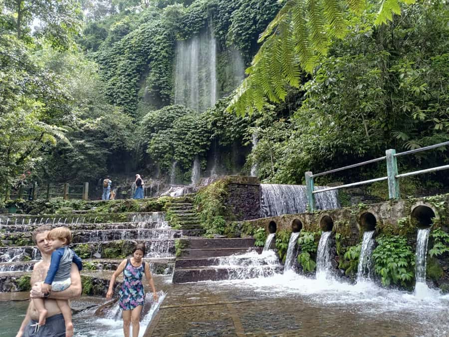 Lombok: Waterfall Benang Kelambu & Rice field Trip - Walking through rice fields with a local guide