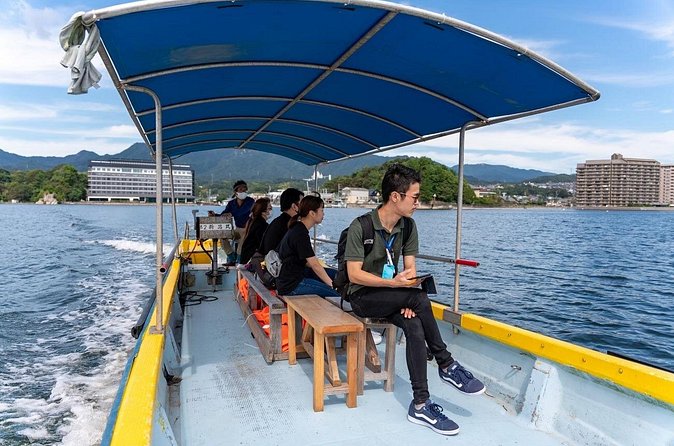 Miyajima Guided Tour and Fresh Oyster Farm Tour - Seeing the Great Torii from the sea