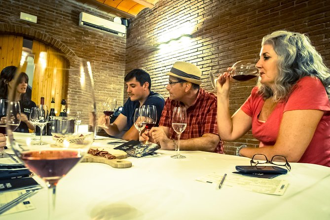Montserrat & Winery Visit Tour with Traditional Farmhouse Lunch - A farmhouse lunch in the Penedès vineyards
