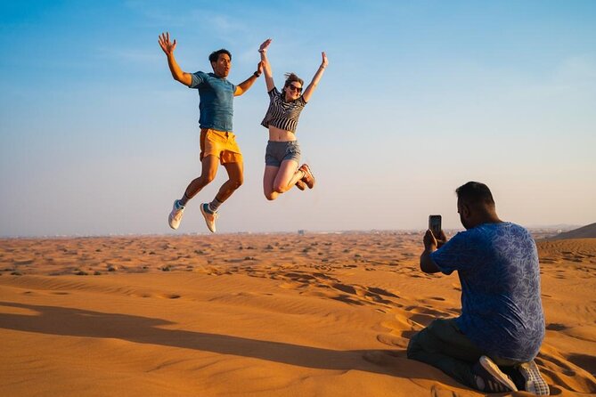 "Morning Desert Safari with Camel Farm visits & Arabic Treats" - Sandboarding adds a simple burst of fun