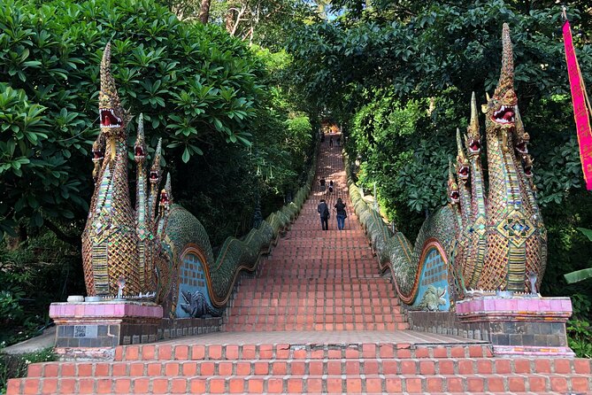 One Day Tour Doi Suthep Temple, Palad Temple, Orchid Farm, Longneck hill tribe village (Private tour) - Meeting the Karen Long Neck Community
