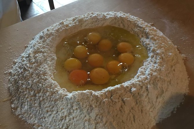 Organic cooking class with a sommelier in an Olive and wine farm - Making pasta with Alina