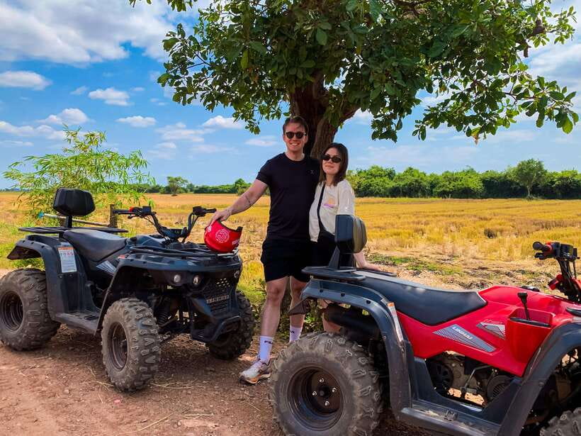 Siem Reap: Khmer Village and Fish Farm ATV Tour - Rice fields, farm work, and open country roads