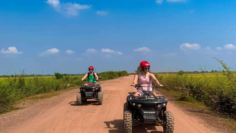 Siem Reap: Khmer Village and Fish Farm ATV Tour - The fish farm and large local fish