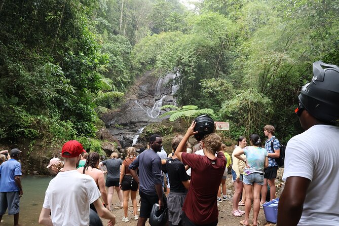 St Lucia ATV Tour : Waterfall, Plantation, Beach and Distillery - Riding through villages and along Roseau Beach