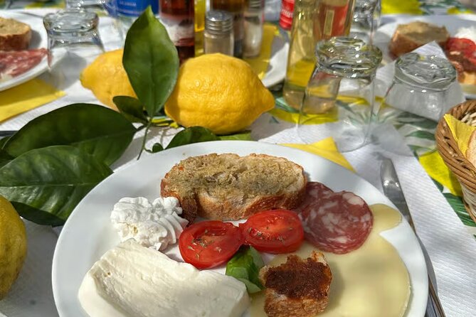 Tasting Limoncello, Oil and Typical Products in Farmhouse - The warm mozzarella demonstration