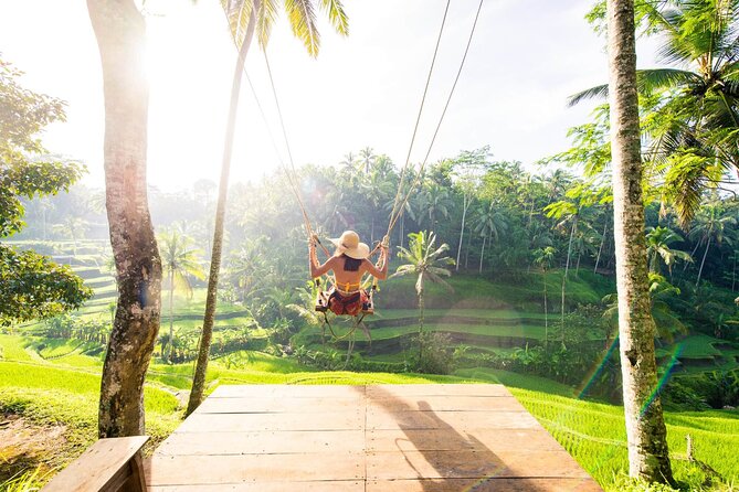 Ubud Full Day Tour Waterfall Monkey Forest Rice Terrace - Cooling off at Tegenungan Waterfall