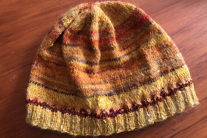 Wool Sheep Farm Experience with Handmade Wool Hat in New Zealand - Choosing a handmade wool hat